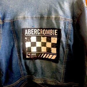 Denim jacket, one of a kind embellished on the back